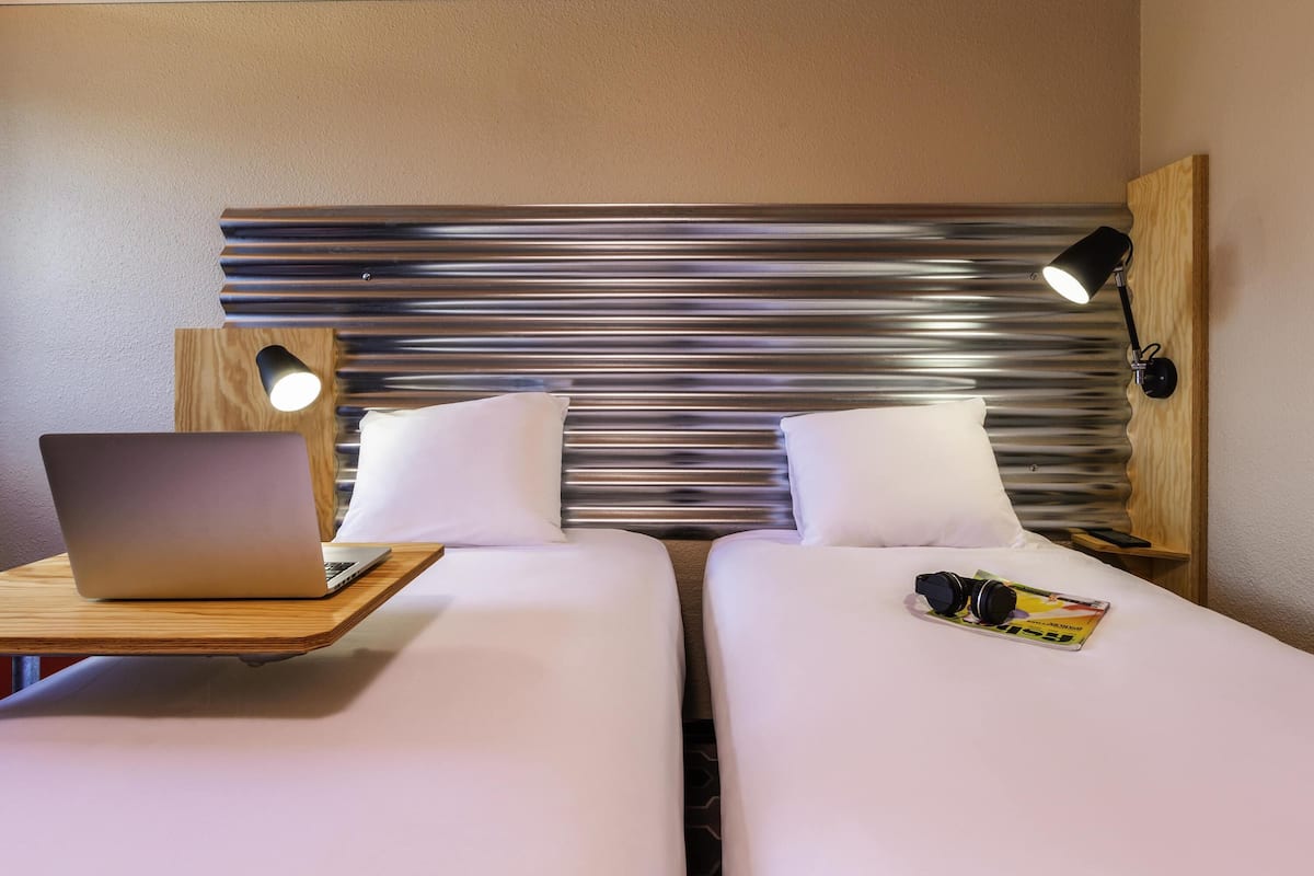 Premium bedding, pillow-top beds, desk, soundproofing