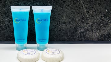 Two tubes of Bastion Douchegel Shampoo and two soap bars.