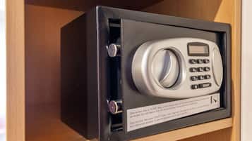 A safe with a keypad and instructions on how to use it.