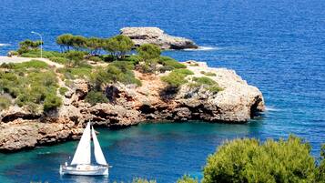 On the beach, white sand, beach yoga, beach bar