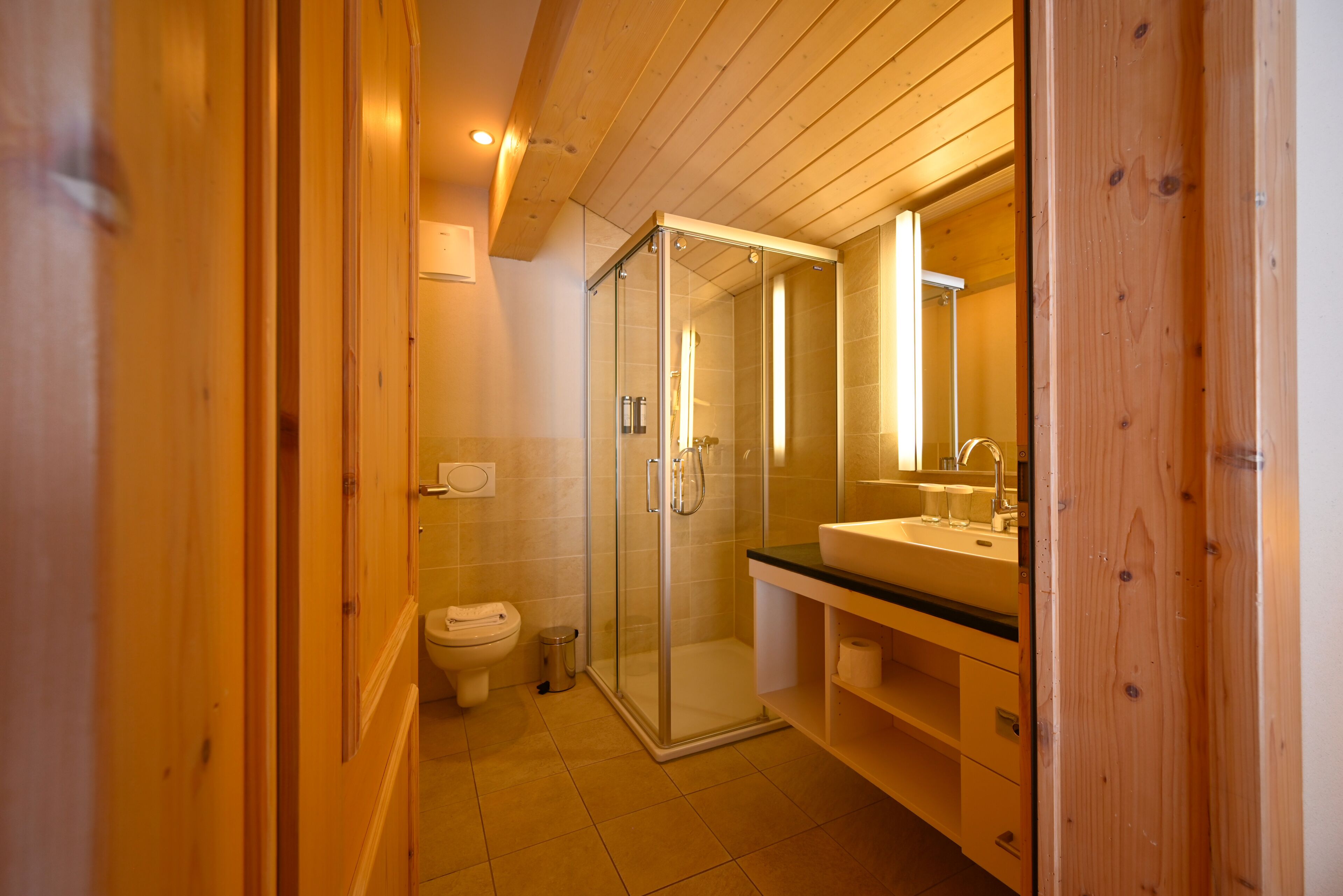 superior suite, 2 bedrooms, balcony, mountain view (eiger) | bathroom | combined shower/bathtub, free toiletries, hair dryer, bathrobes