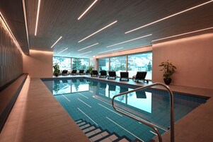 Indoor pool, open 7:00 AM to 11:00 PM, sun loungers