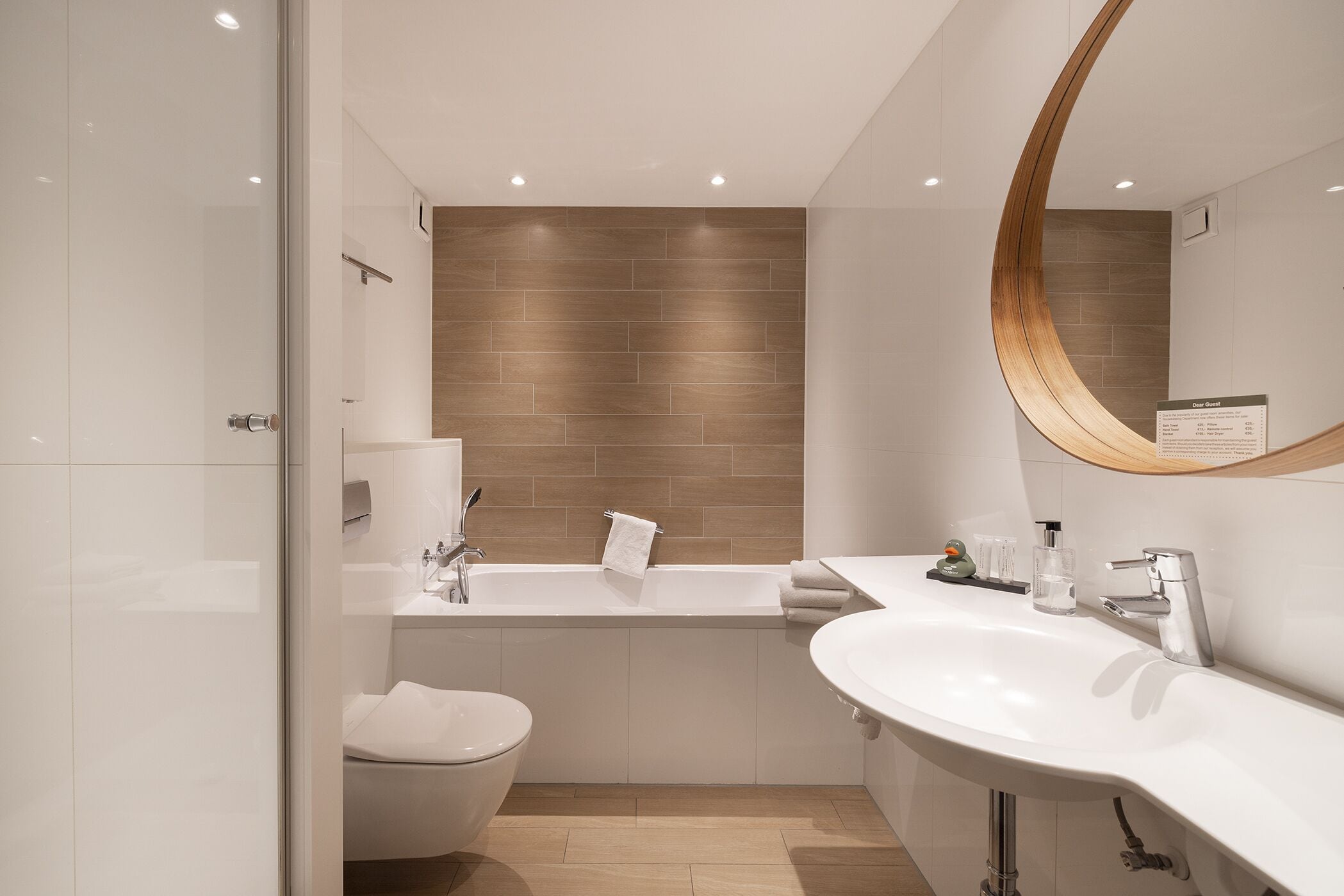 separate bathtub and shower, free toiletries, hair dryer, towels