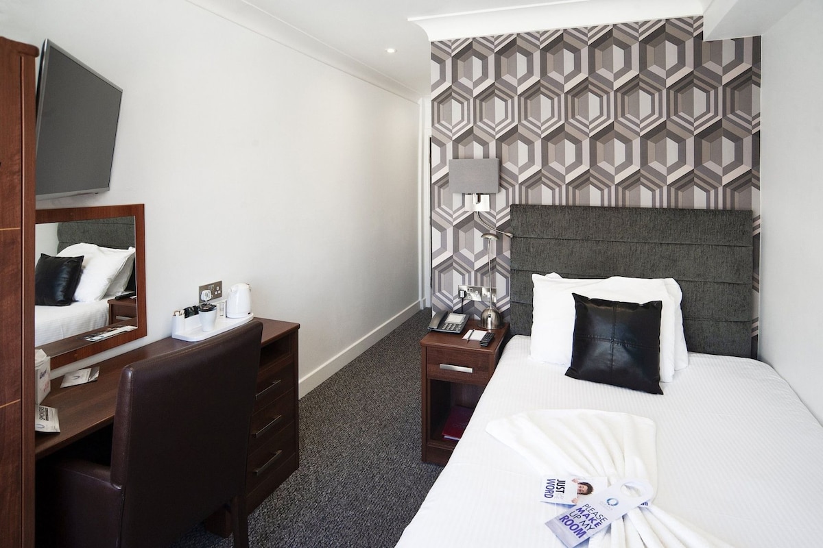 Desk, iron/ironing board (on request), free WiFi, bed sheets