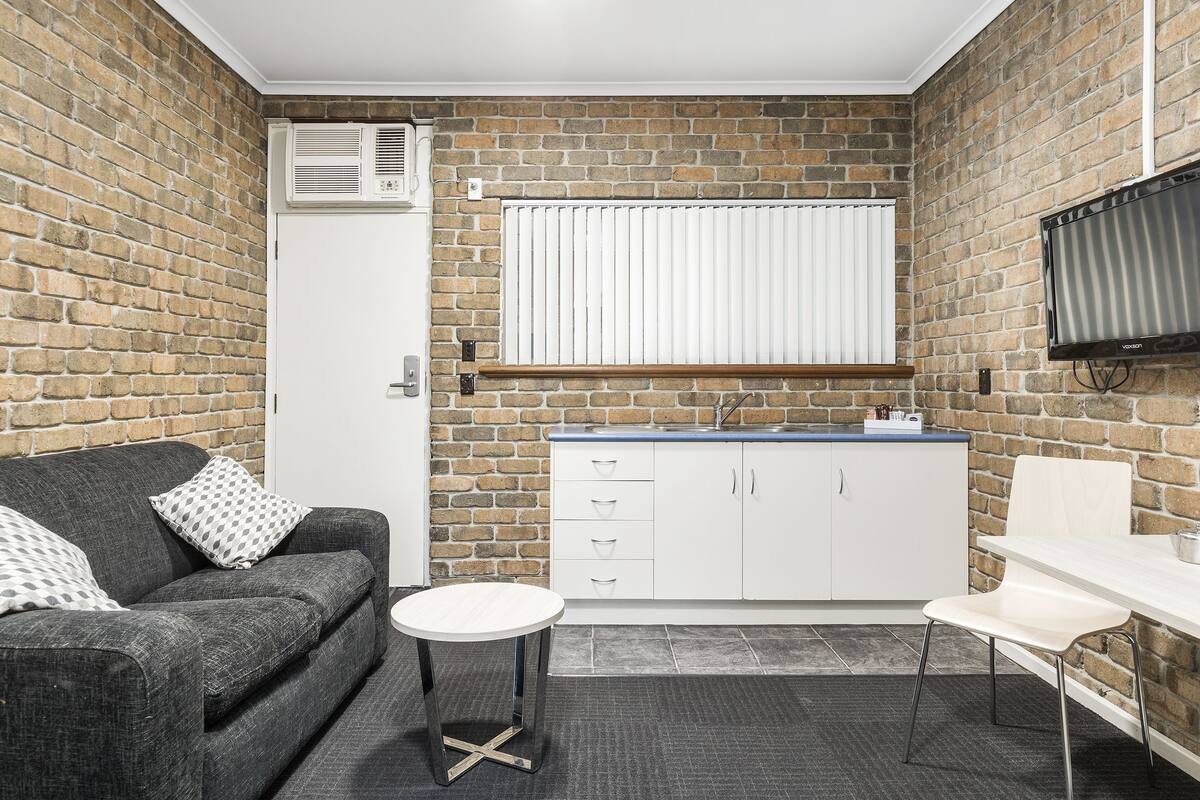 standard room, kitchenette | living area | 32-inch tv with cable channels