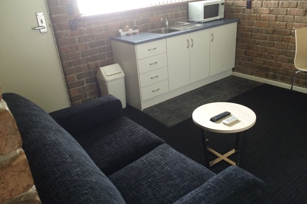 standard room, kitchenette | living area | 32-inch tv with cable channels