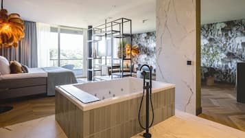 Be Serene Suite | Bathroom | Separate tub and shower, free toiletries, towels