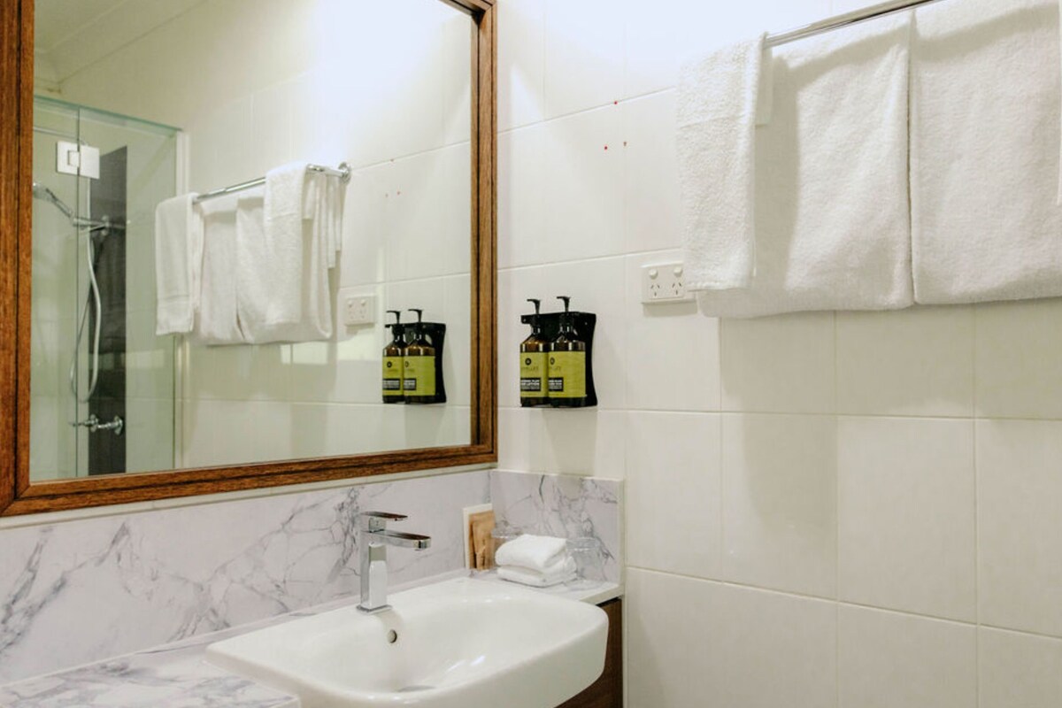Shower, eco-friendly toiletries, hair dryer, towels