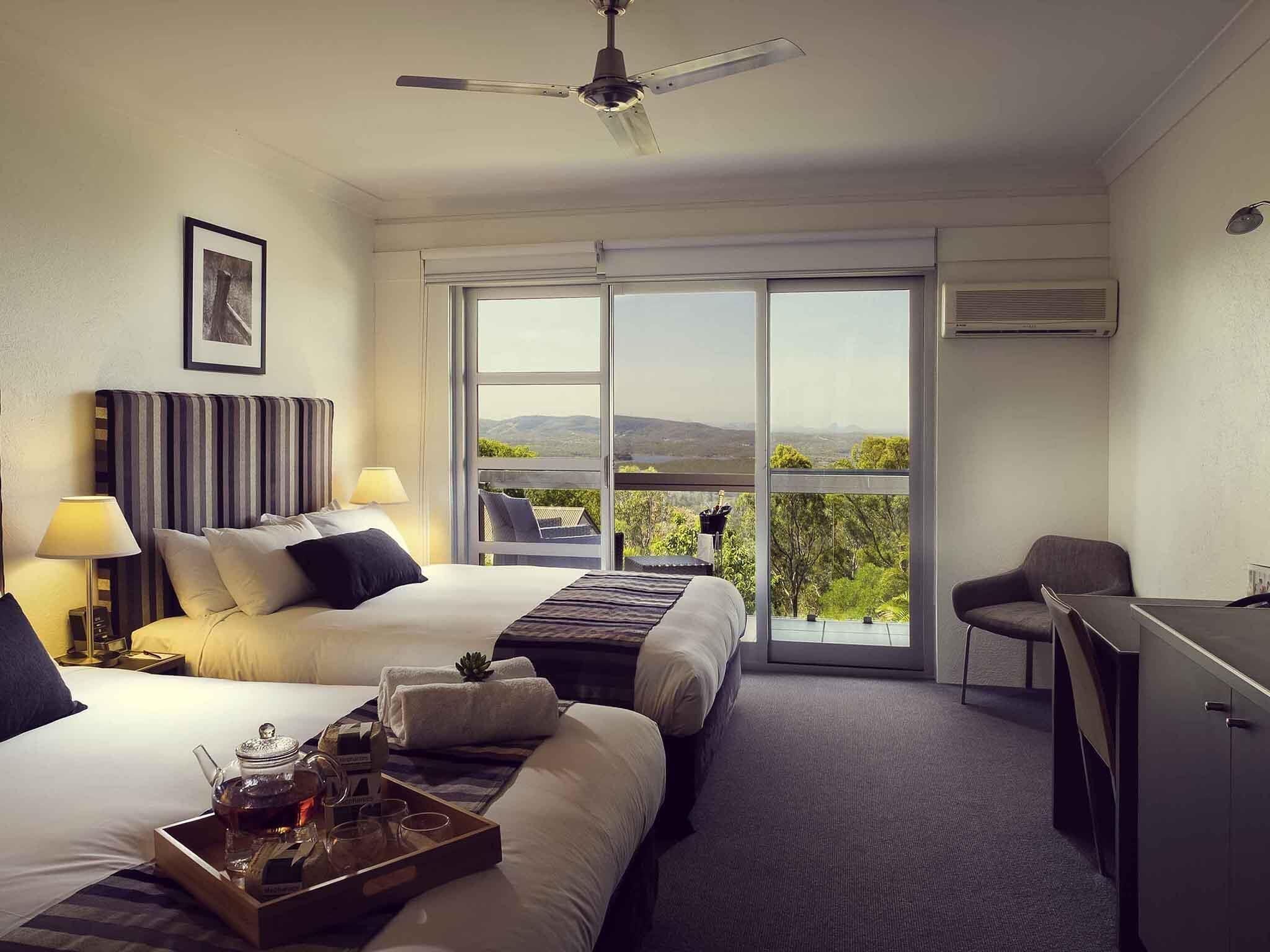 Standard Room, 2 Queen Beds | Desk, iron/ironing board, cots/infant beds, free WiFi