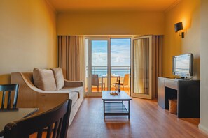 Family Suite | Sala de estar | TV de tela plana 40 polegadas com canais a cabo, TV