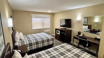 Premium bedding, desk, laptop workspace, blackout curtains