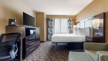 Desk, laptop workspace, blackout curtains, iron/ironing board