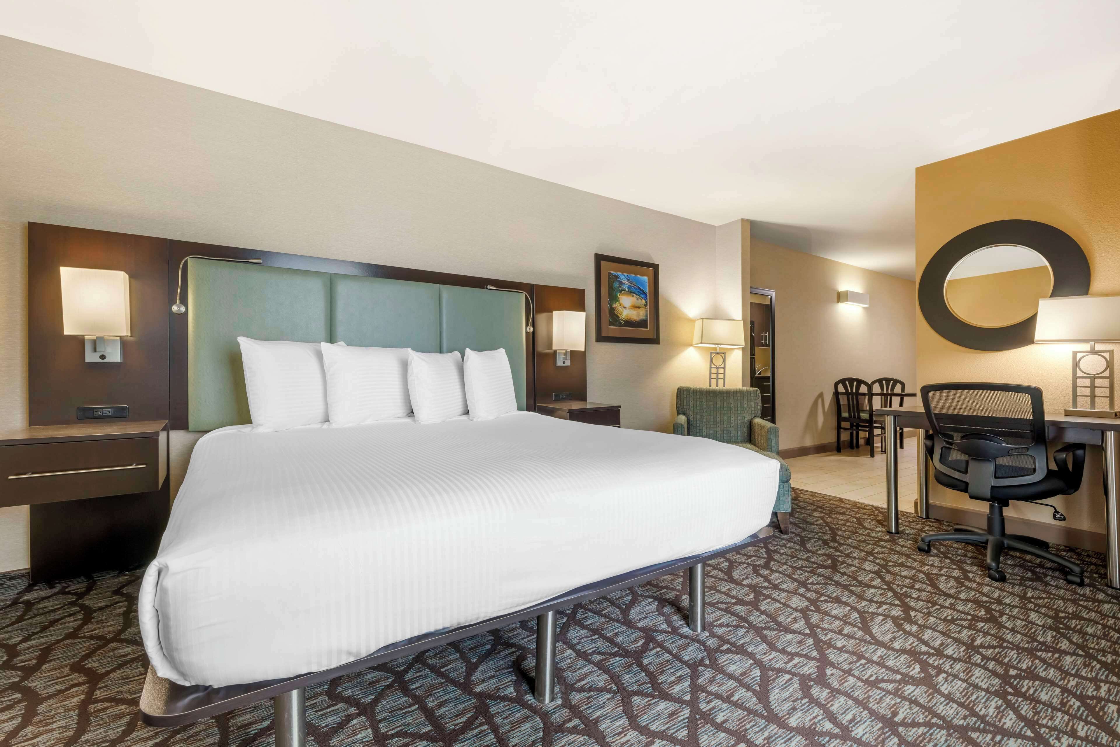 desk, laptop workspace, blackout curtains, iron/ironing board