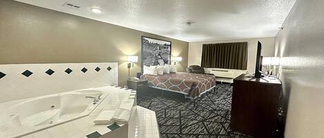 Studio Suite, 1 King Bed, Non Smoking | Individually decorated, individually furnished, desk, blackout drapes