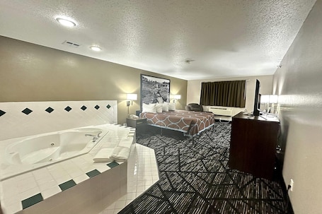 Studio Suite, 1 King Bed, Non Smoking | Individually decorated, individually furnished, desk, blackout drapes