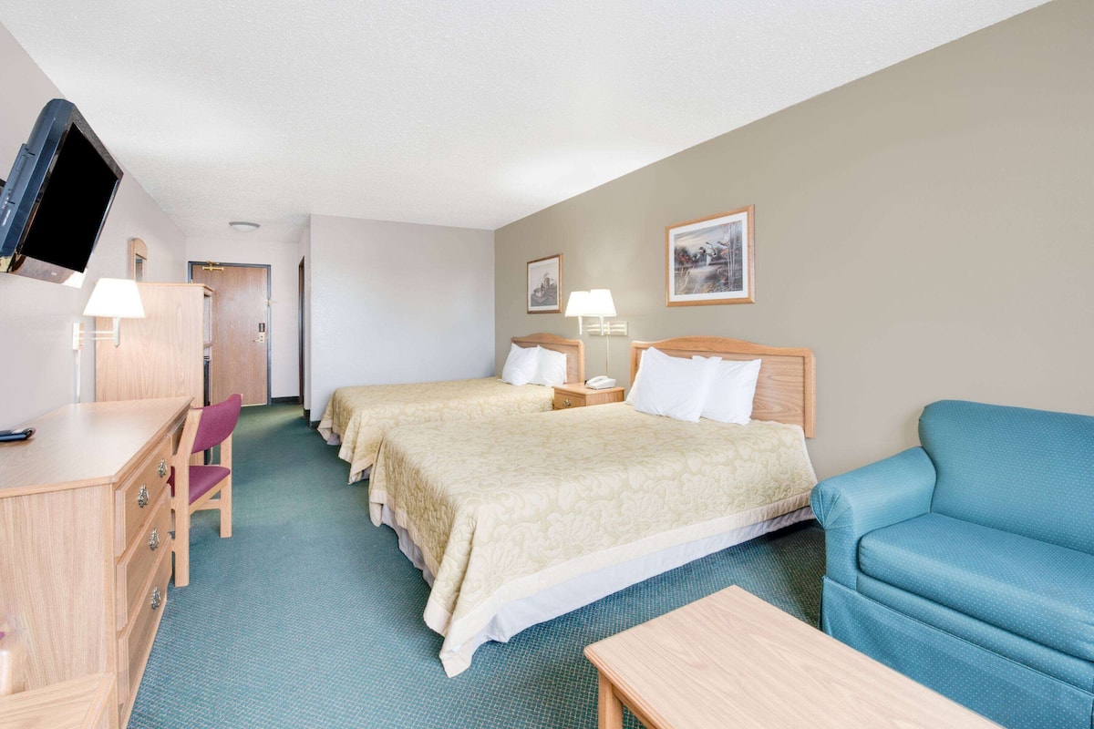 Room, 2 Queen Beds, Non Smoking | Individually decorated, individually furnished, desk, blackout drapes
