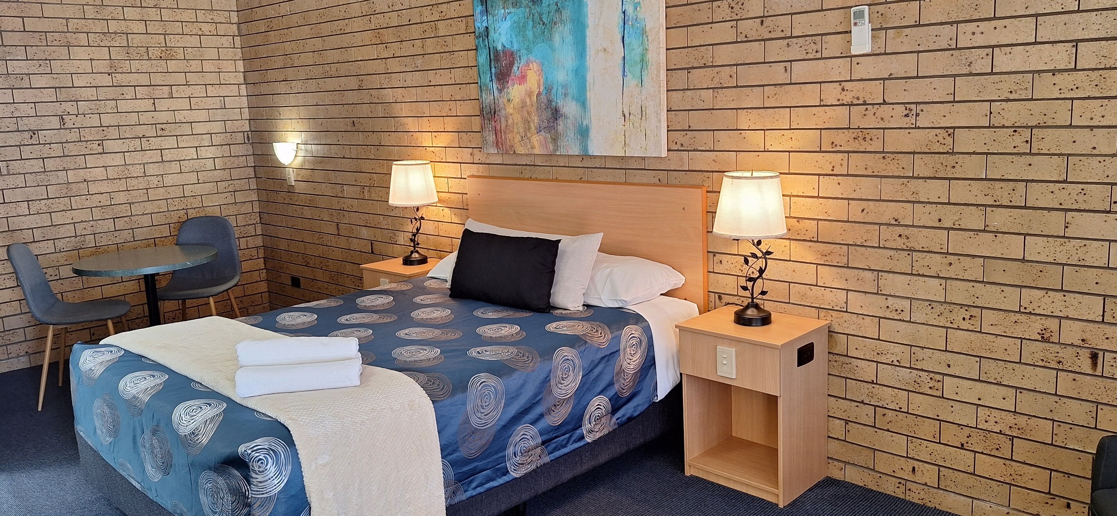 Deluxe Room, 1 Queen Bed (Ground Floor) | Desk, iron/ironing board, free WiFi, bed sheets