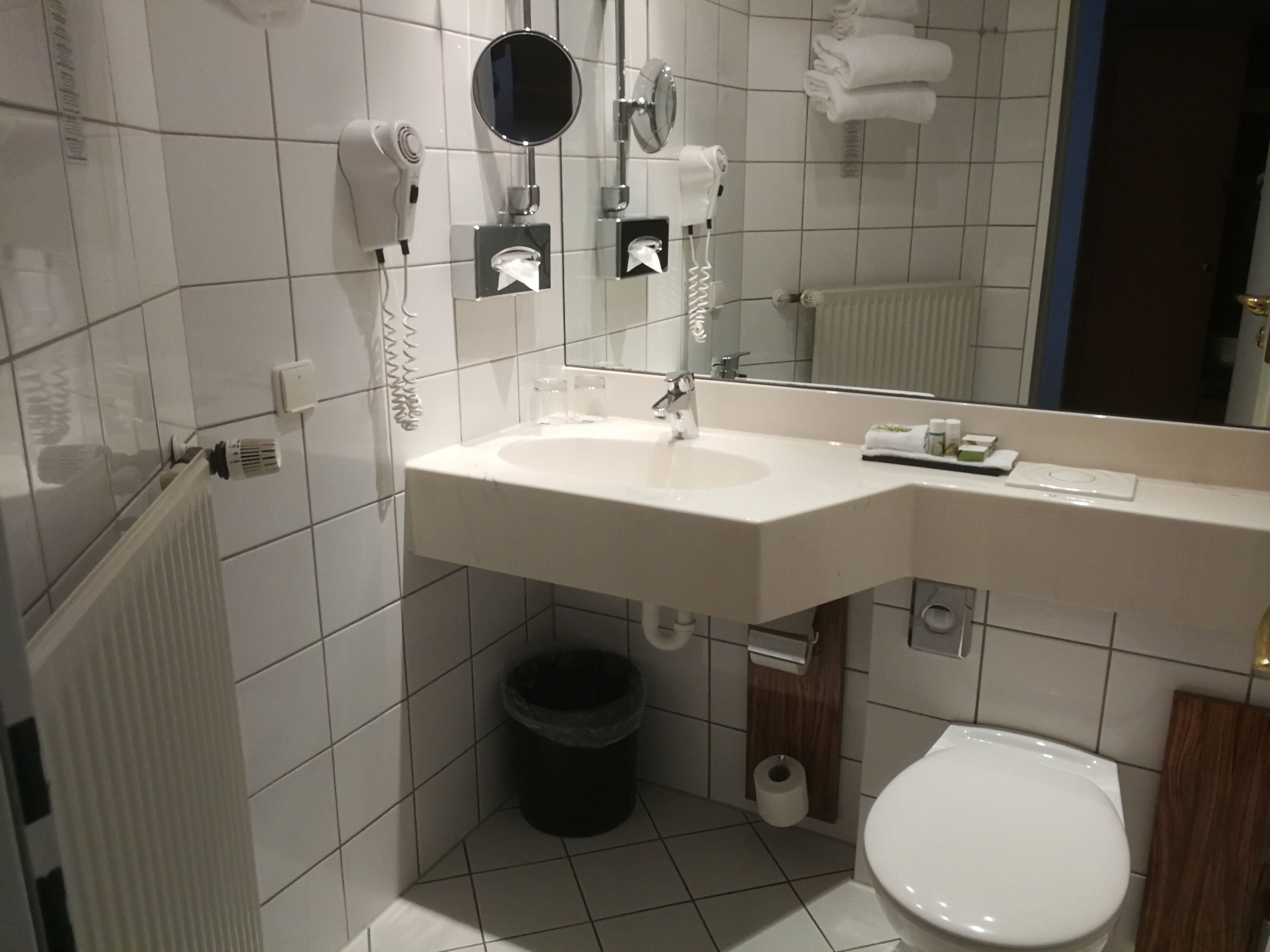 shower, eco-friendly toiletries, hair dryer, slippers