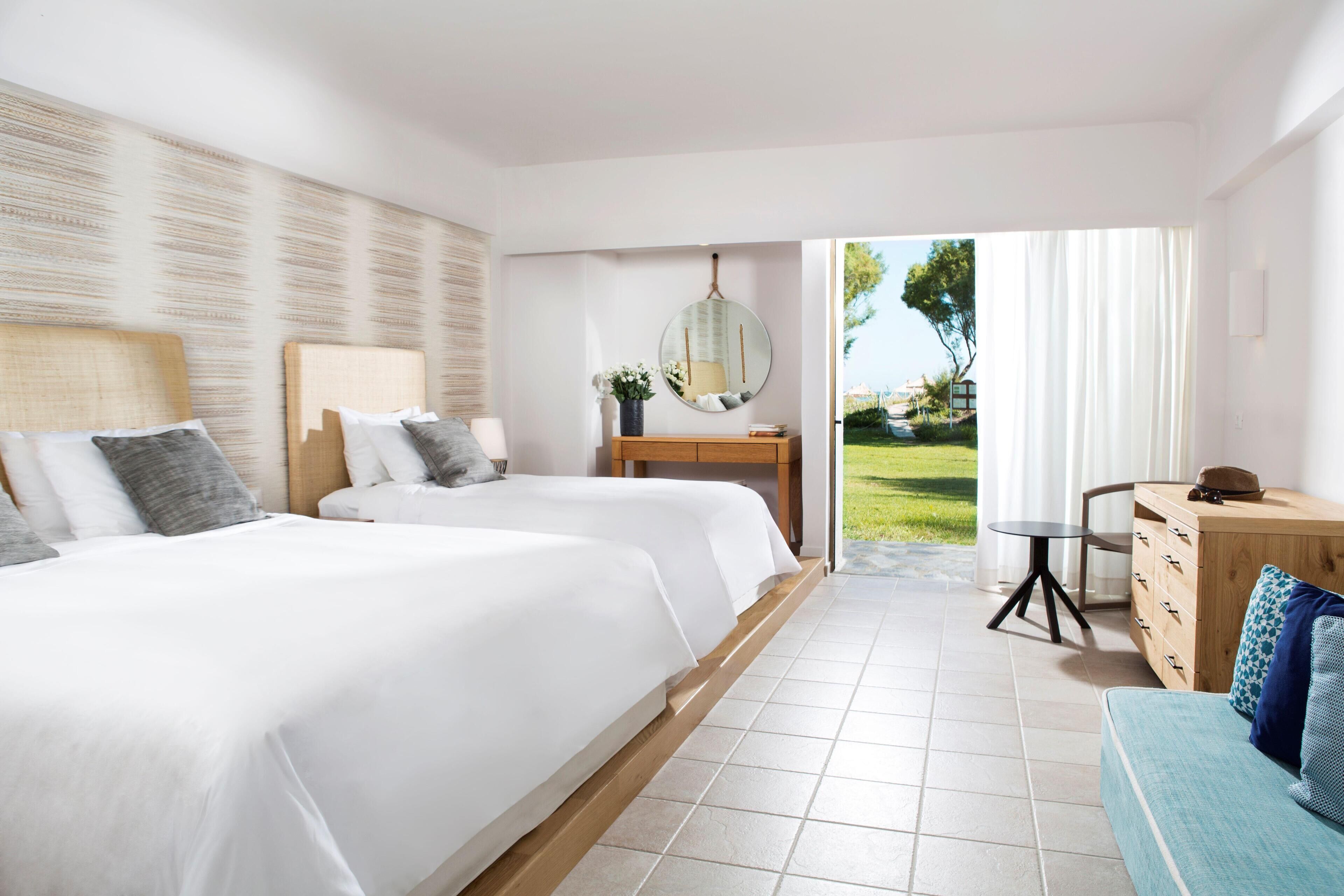 Habitació familiar | Roba de llit hipoal·lergògena i caixa forta a l'habitació 