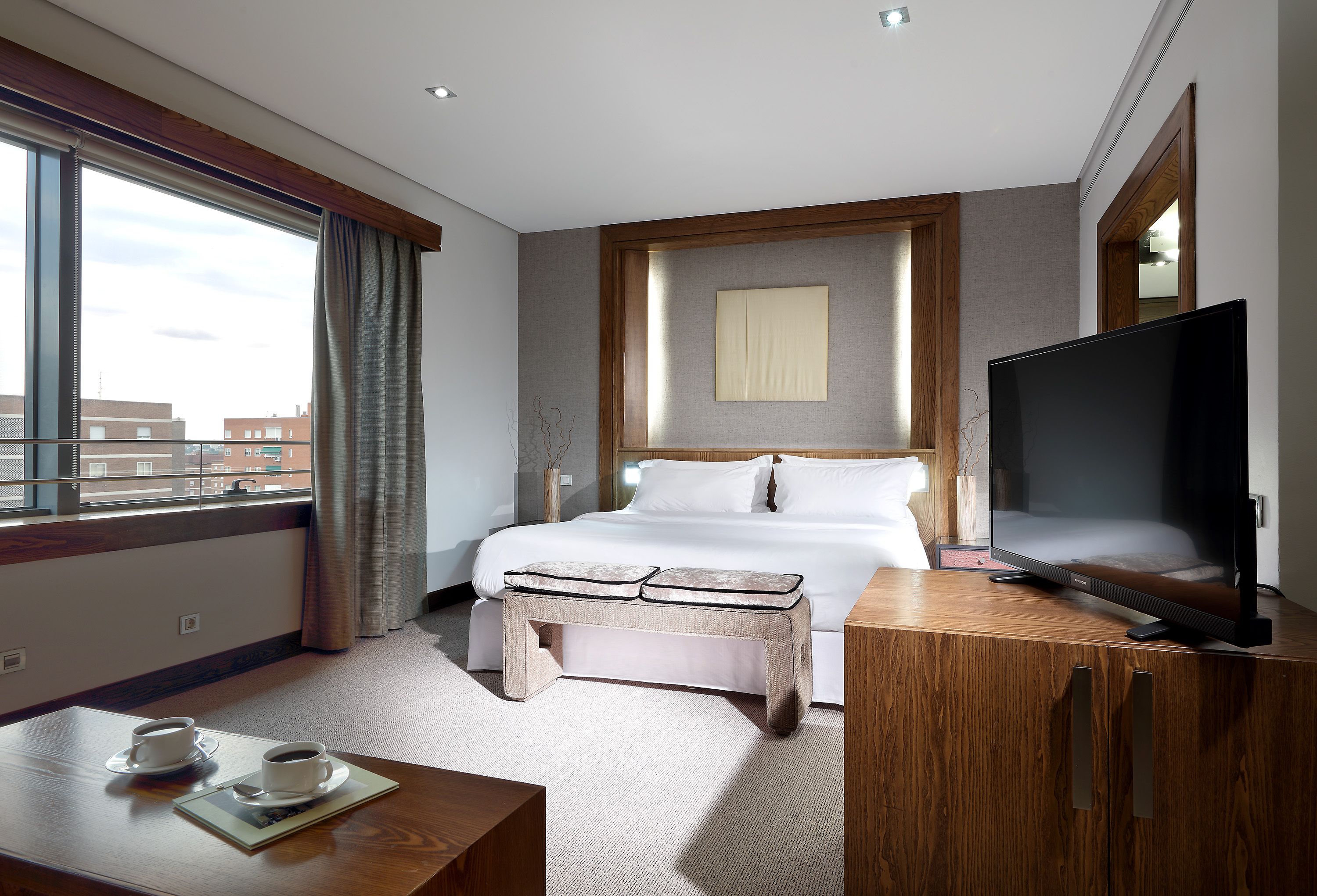 deluxe suite | premium bedding, down duvets, minibar, in-room safe