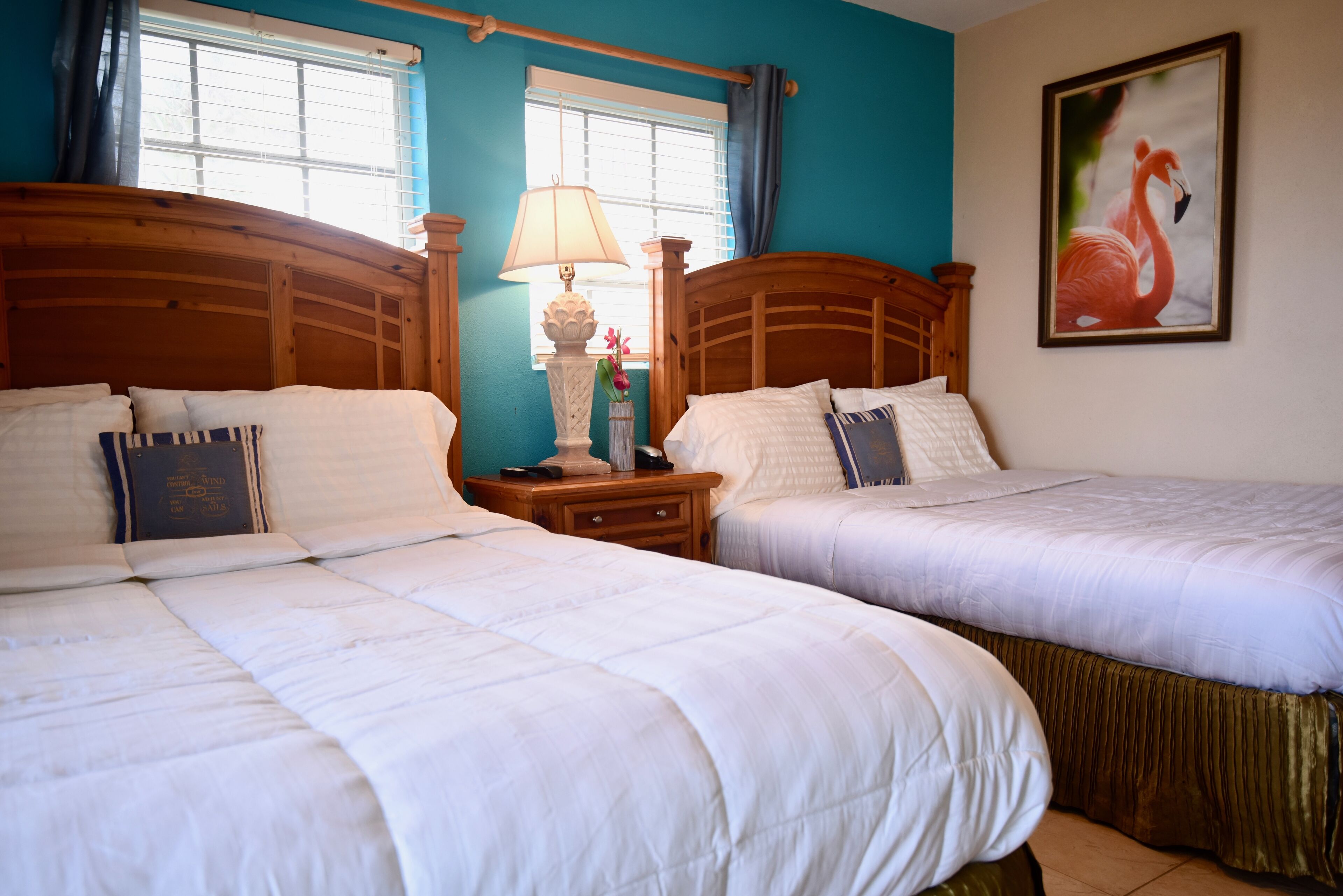 deluxe double room, 2 queen beds, beach view | 1 bedroom, egyptian cotton sheets, premium bedding