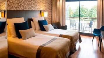 Premium bedding, pillowtop beds, minibar, in-room safe