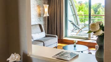 Deluxe Suite, 1 King Bed, Terrace (Grounds view) | Living area | 55-inch flat-screen TV with satellite channels, TV, offices