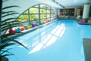 Indoor pool, open 7:00 AM to 10:00 PM, pool loungers
