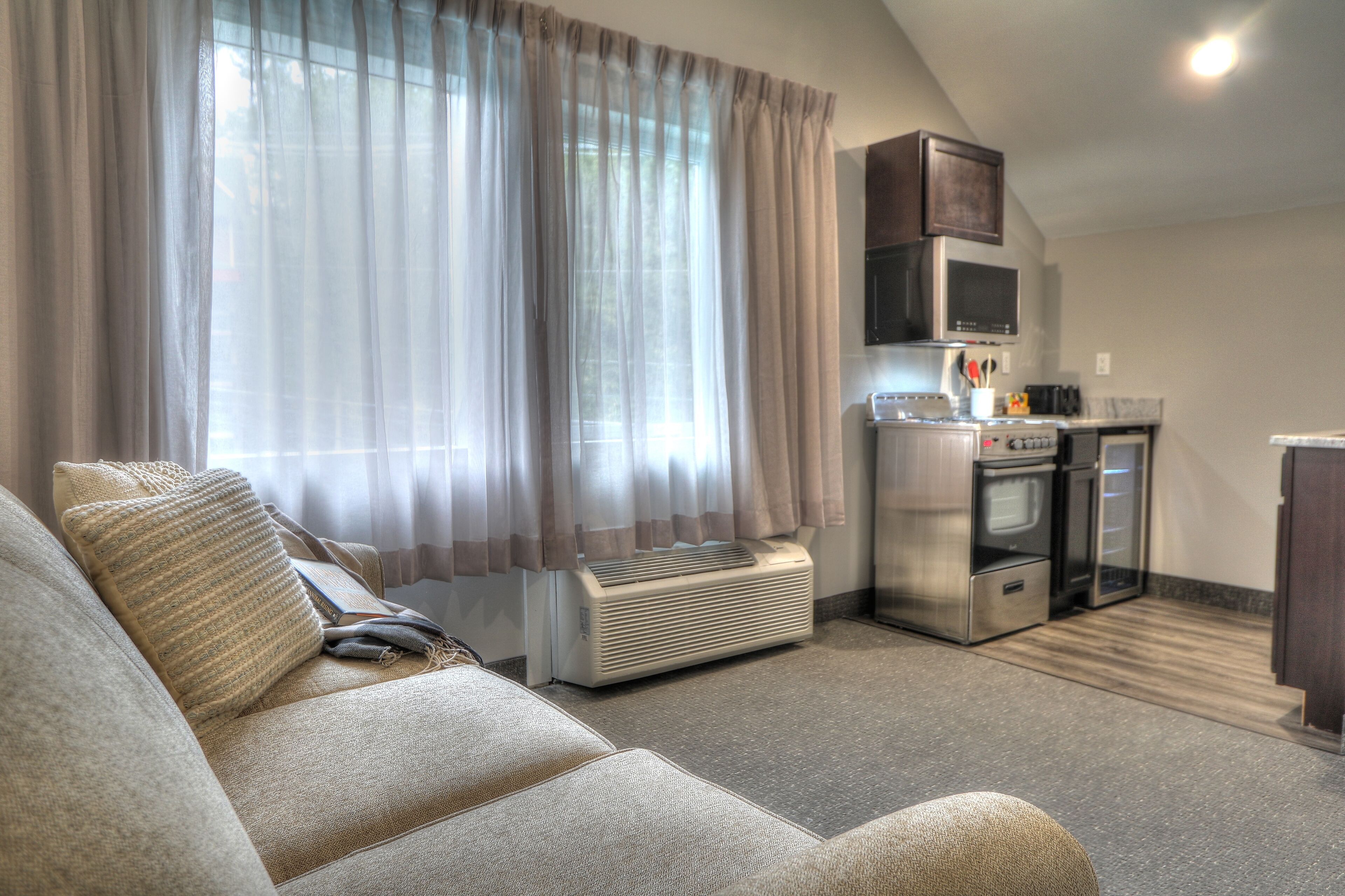 family suite, 2 bedrooms, kitchenette (private balcony) | living area | 32-inch tv with cable channels