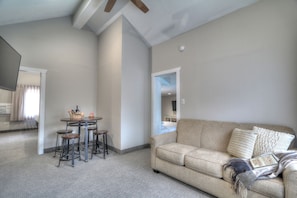 Family Suite, 2 Bedrooms, Kitchenette (Private Balcony) | Living room | 32-inch TV with cable channels