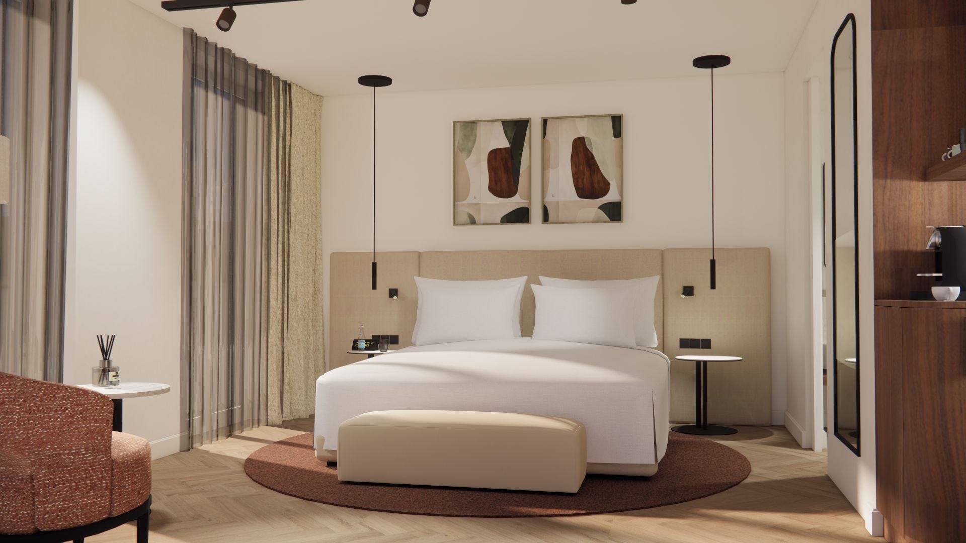 A modern hotel room with a large bed, bedside tables, a seating area, and artwork on the wall.