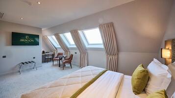 Hypo-allergenic bedding, down duvets, pillow-top beds, minibar