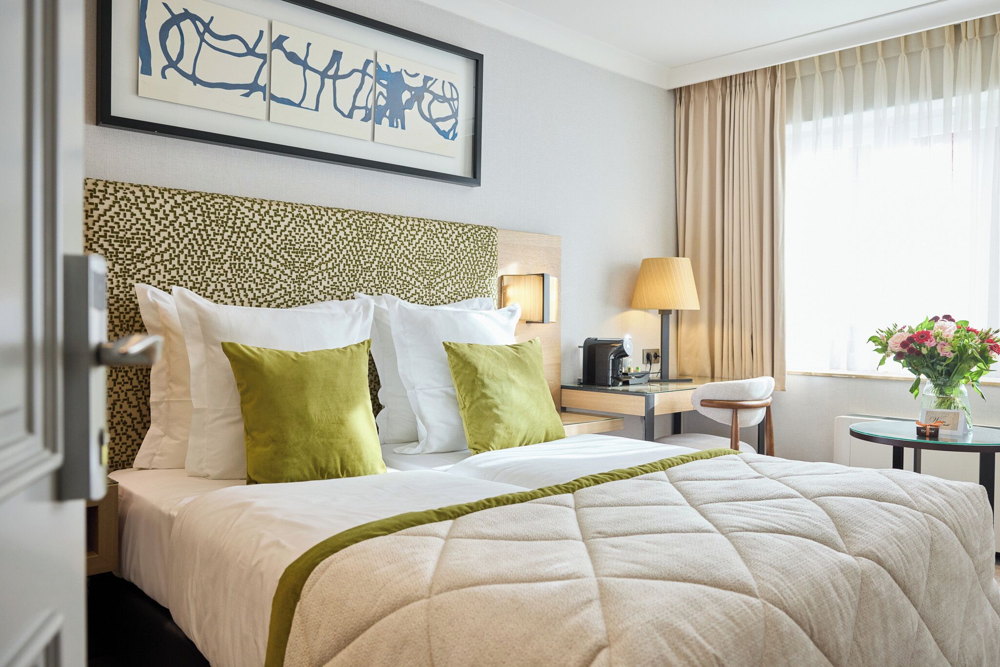 Hypo-allergenic bedding, down duvets, pillow-top beds, minibar