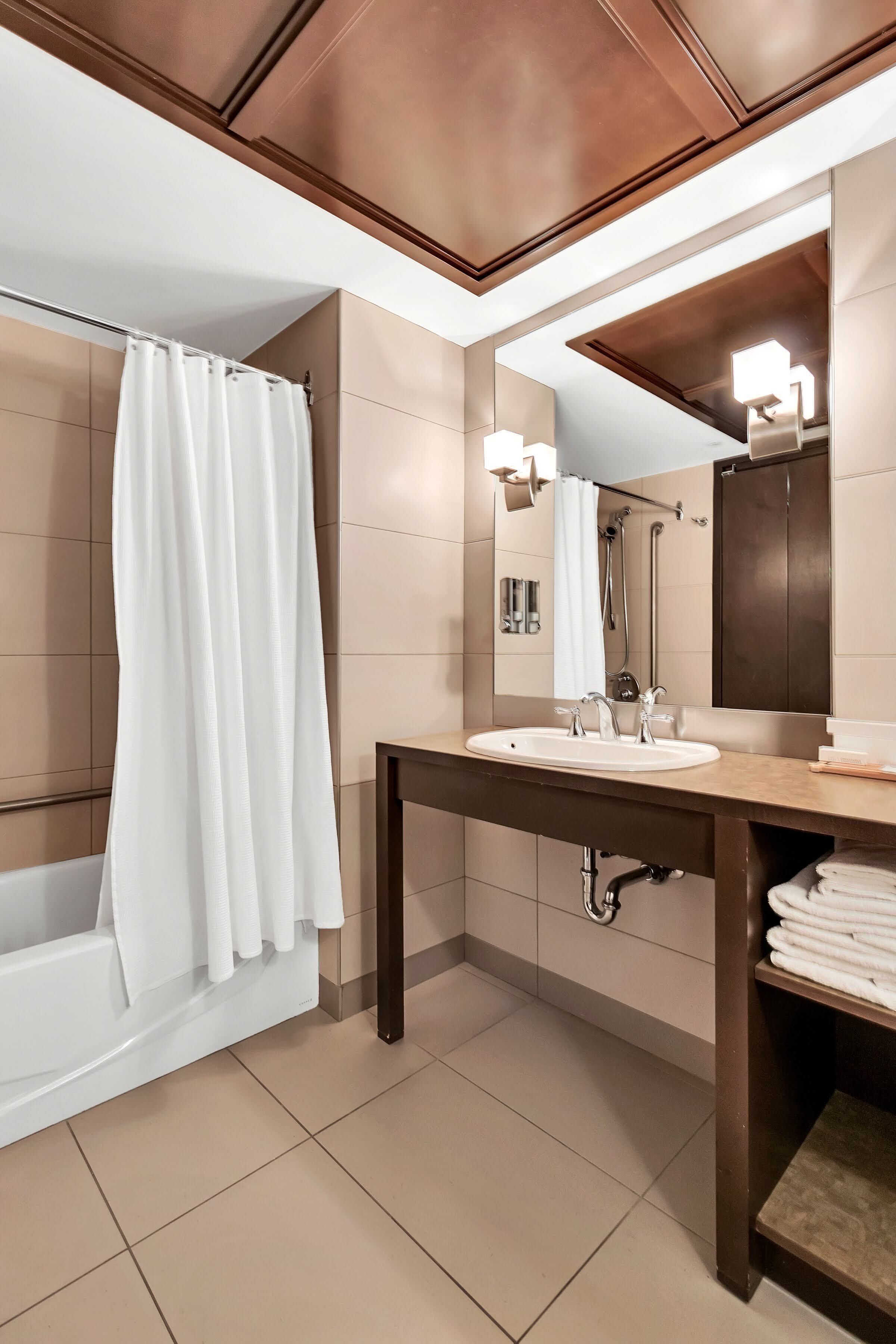 hair dryer, bathrobes, towels, soap