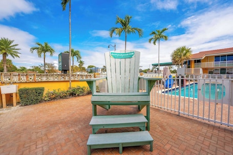 Outdoor pool, open 9:00 AM to 8:00 PM, pool umbrellas, sun loungers