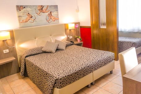 Premium bedding, down duvets, Select Comfort beds, in-room safe