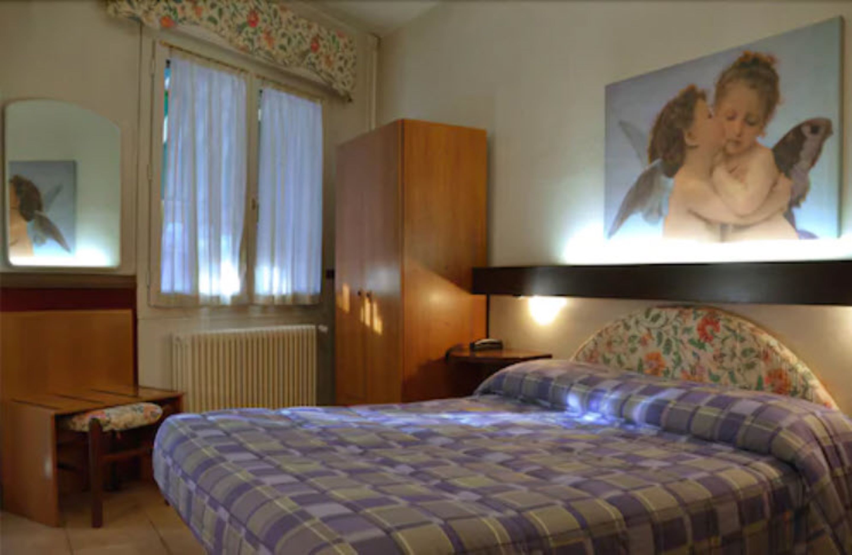 quadruple room | premium bedding, select comfort beds, in-room safe, desk