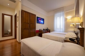 Triple Room | Down comforters, minibar, in-room safe, desk