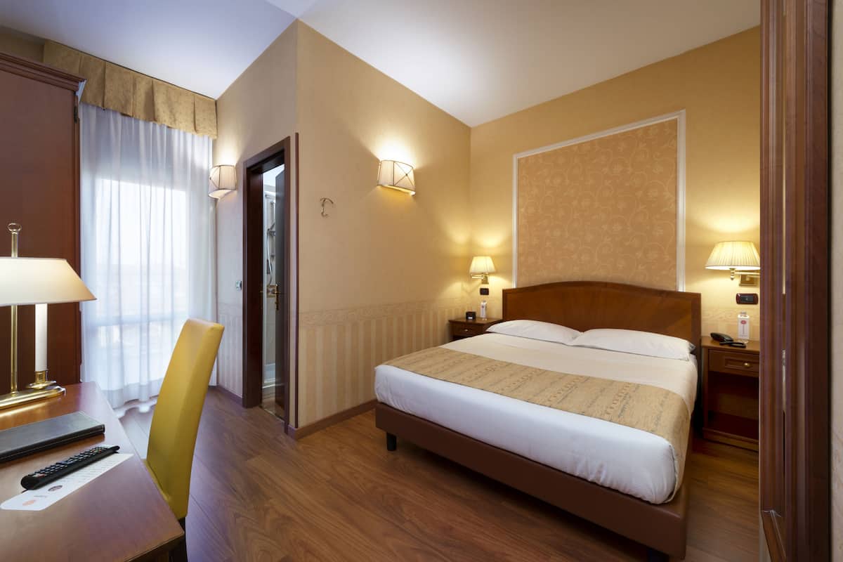 Classic Double or Twin Room | Down comforters, minibar, in-room safe, desk