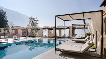 Seasonal outdoor pool, pool loungers