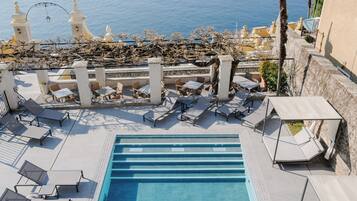 Seasonal outdoor pool, sun loungers