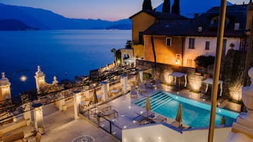 Seasonal outdoor pool, pool loungers