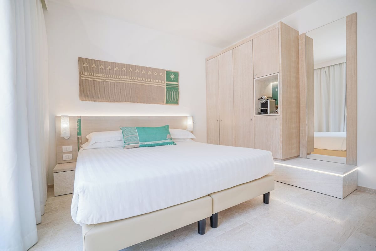 Quarto design | 1 quarto, frigobar, escrivaninha, Wi-Fi de cortesia