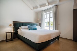 Junior Triple Room, 1 Bedroom, Balcony, Sea View | Minibar, desk, free WiFi, bed sheets - Felix Hotels - Hotel La Coluccia (Santa Teresa di Gallura)