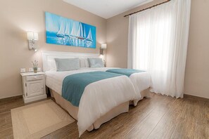 Hypo-allergenic bedding, down duvets, memory-foam beds, in-room safe