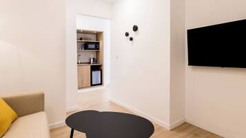 Minibar, desk, laptop workspace, blackout curtains