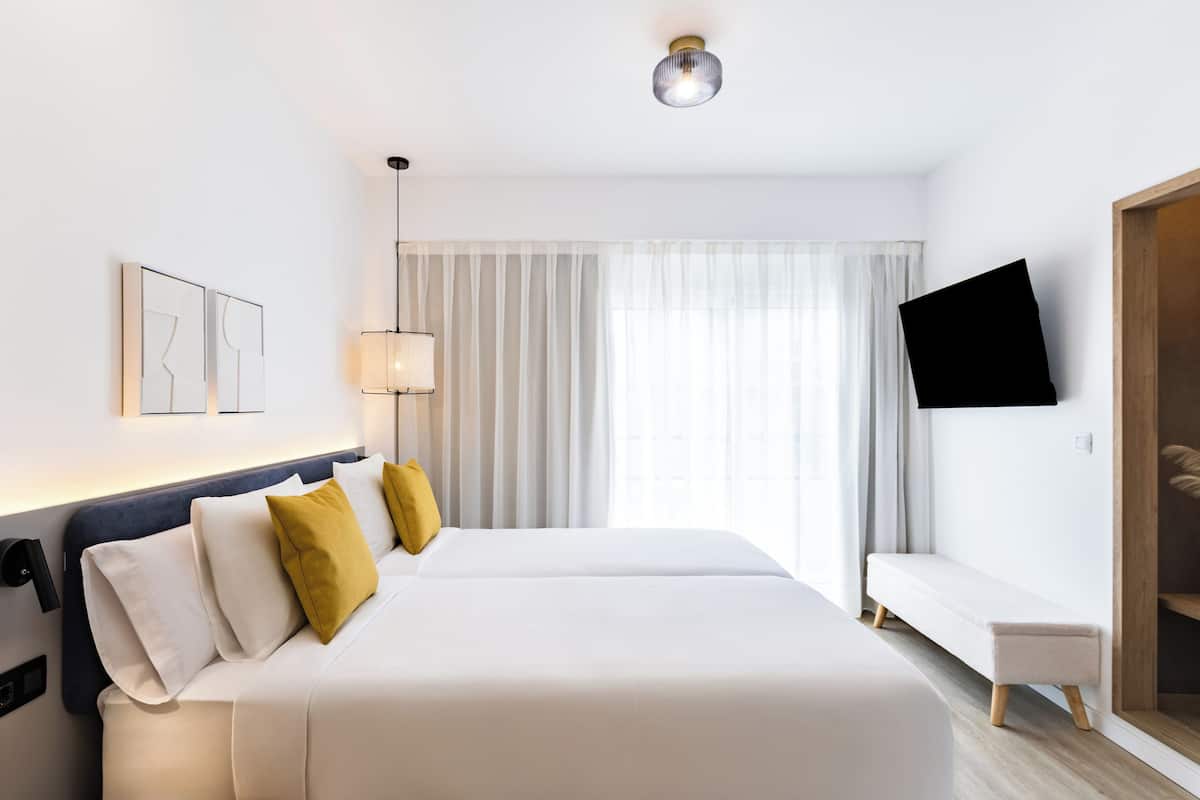 Minibar, desk, laptop workspace, blackout drapes