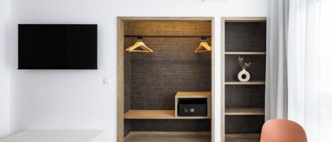 Minibar, desk, laptop workspace, blackout curtains