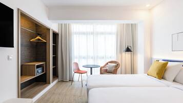 Minibar, desk, laptop workspace, blackout curtains