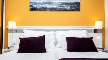 Down comforters, individually furnished, desk, free WiFi